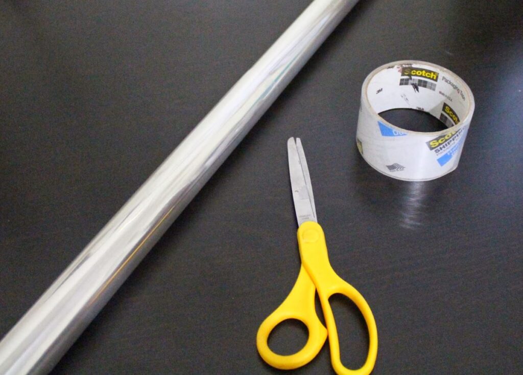 Cutting plastic sheet for mehndi cone